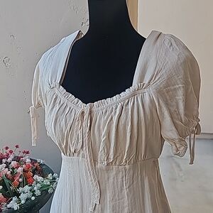 Princess style smocked back romper by LeLis size medium